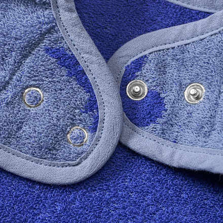 Mouwslabbetje met dinosaurussenpatroon, blauw, 1 stuk