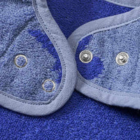 Mouwslabbetje met dinosaurussenpatroon, blauw, 1 stuk