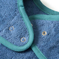 Slabbetje met mouwen &amp; dinosaurusmotief, blauw, 1 stuk