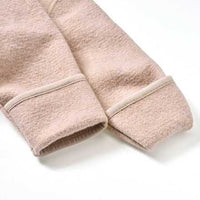 Overall van gekookte wol met variabele mouwen, beige, maat 74/80, 1 stuk