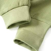 Set bestaande uit wikkelbody en broek met meegroeifunctie, groen, maat 62/68, 1 st.