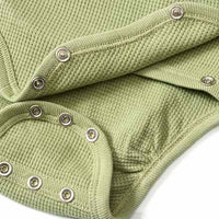 Set bestaande uit wikkelbody en broek met meegroeifunctie, groen, maat 62/68, 1 st.